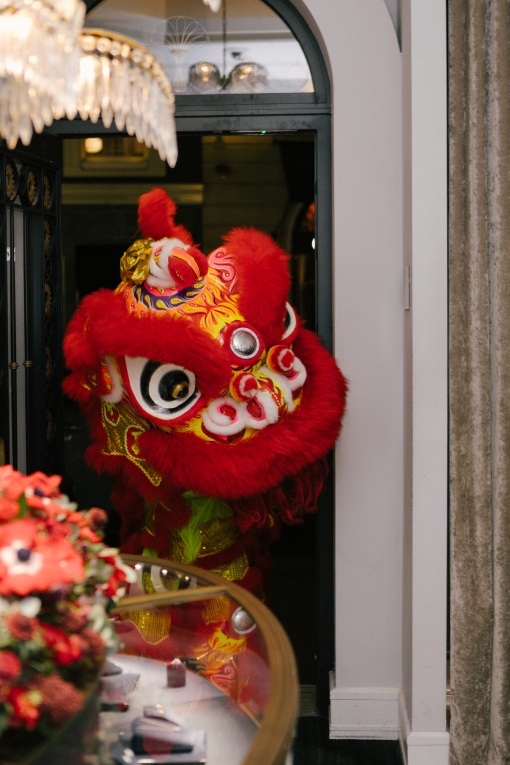 Chinese lion costume dancing in doorway