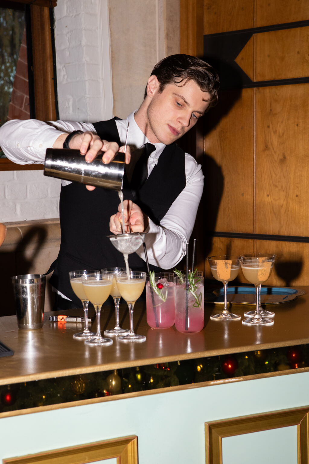 bartender pouring cocktails
